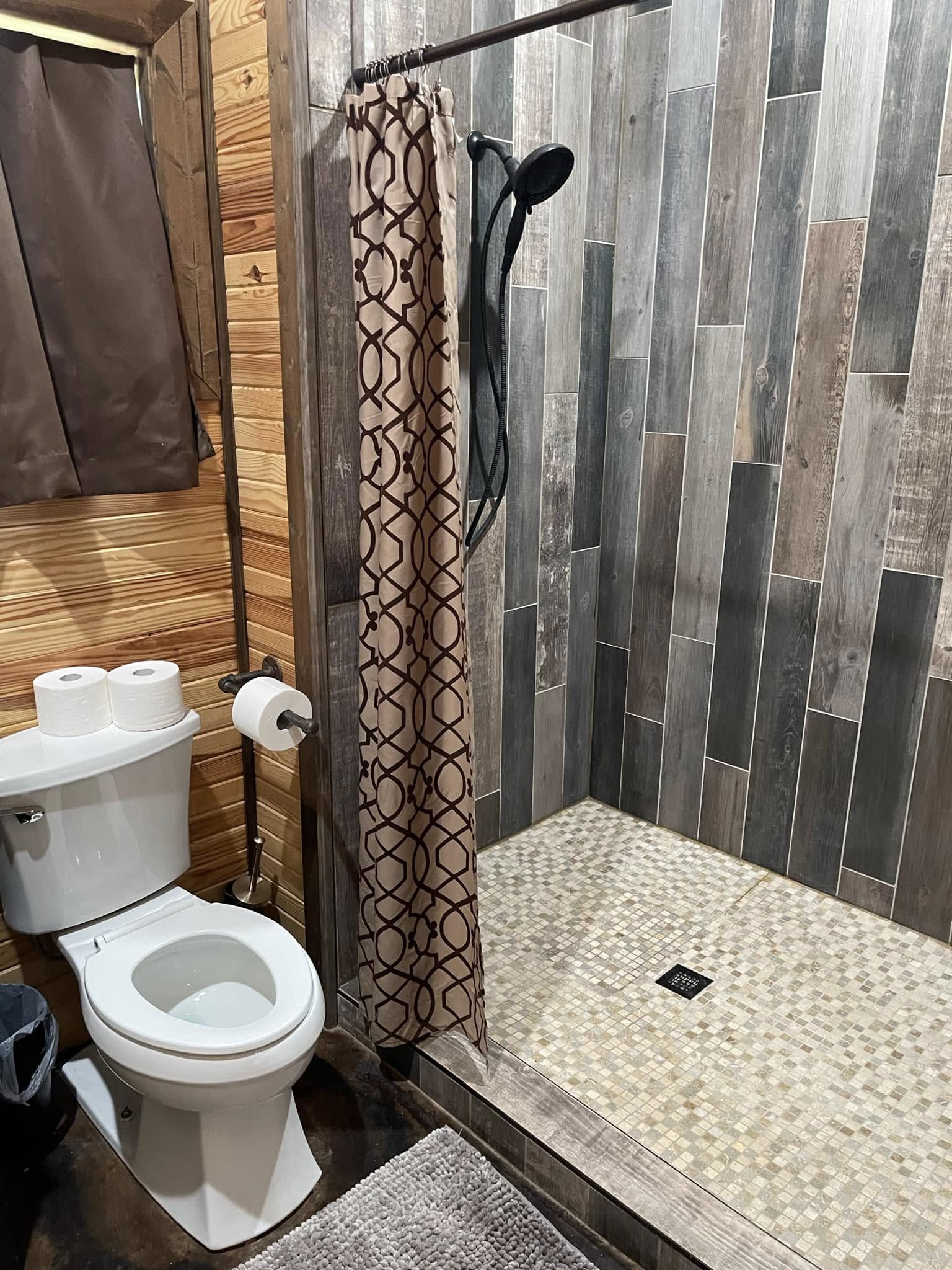 Bathroom and walk-in shower inside the WOW Ranch lodge