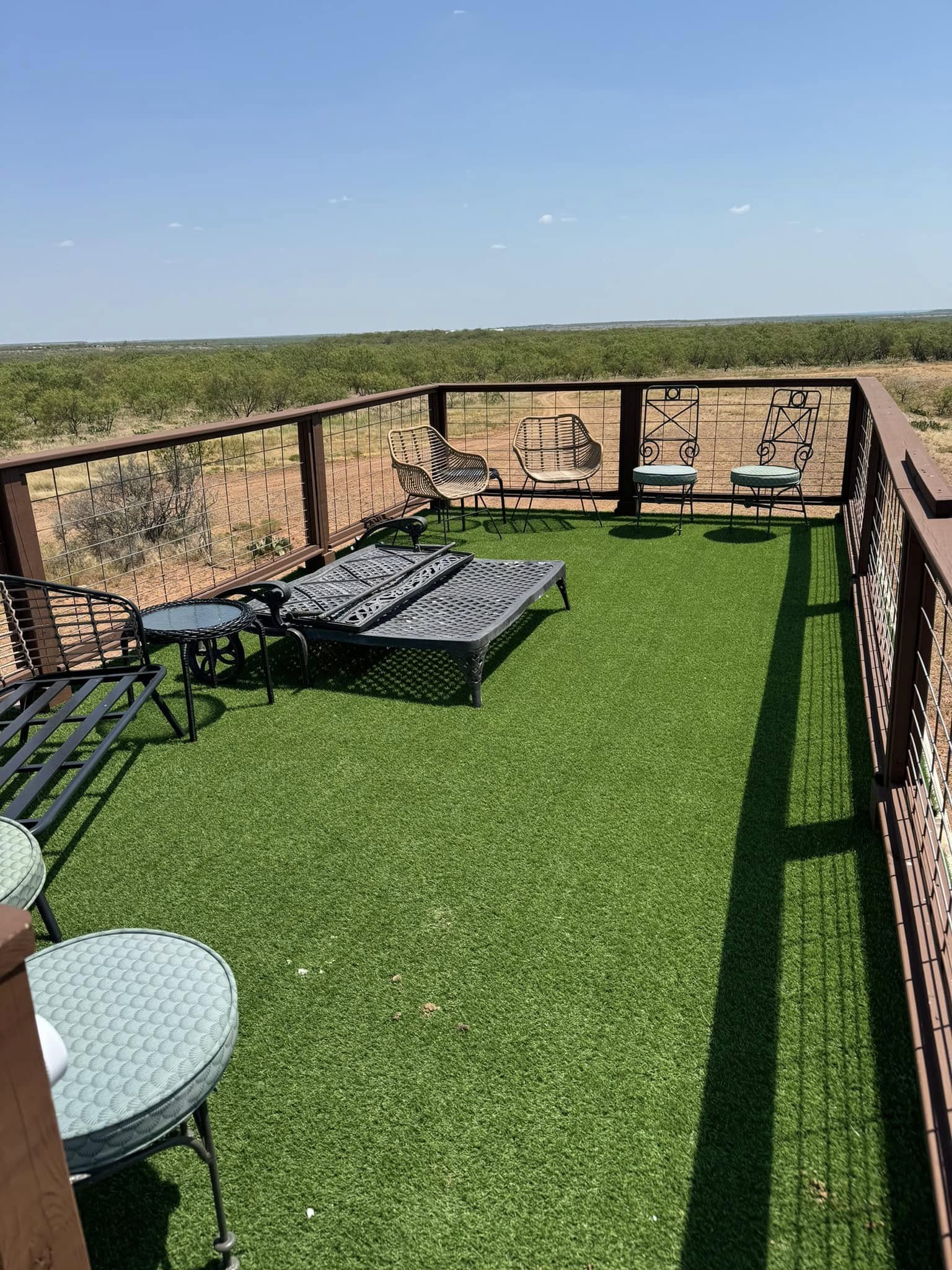 Sunset Cabin rooftop deck overlooking the Texas landscape